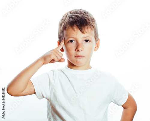 young pretty little boy wondering face gesturing, pointing isolated on white background