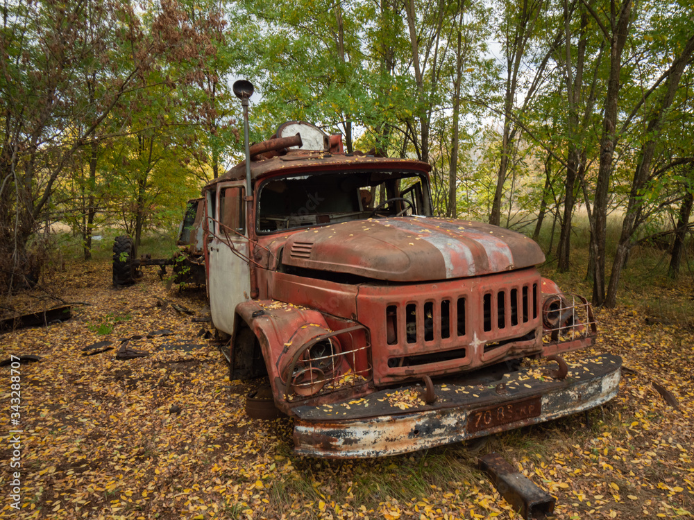 Scrap of fire truck left after the Chernobyl disaster. Chernobyl Exclusion Zone, Ukraine. Scrap of fire truck left after the Chernobyl disaster. Chernobyl Exclusion Zone, Ukraine.