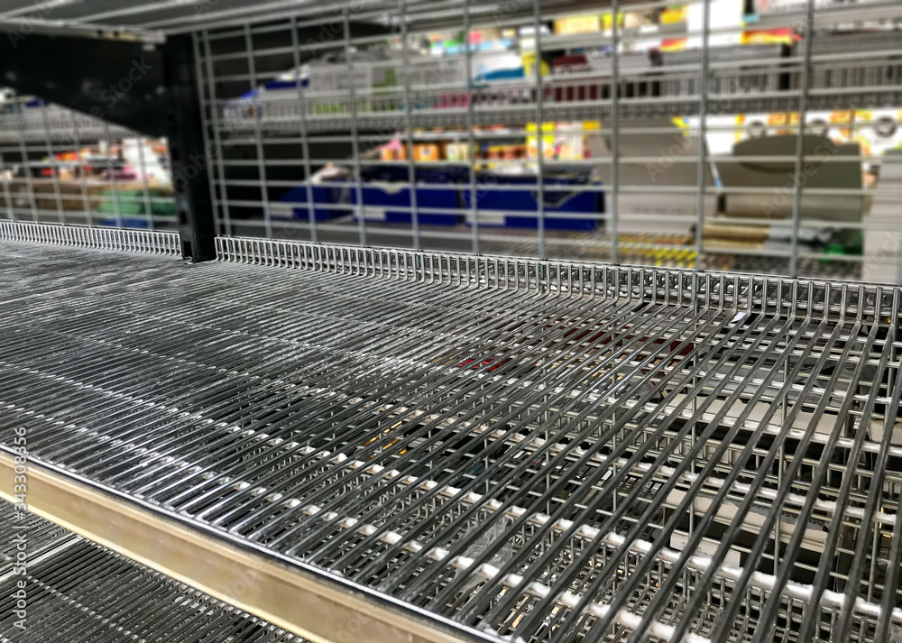 COVID-19 Outbreak. Image of Empty supermarket shelves amid panic buying during coronavirus shutdowns COVID-19 Outbreak. Image of Empty supermarket shelves amid panic buying during coronavirus shutdowns