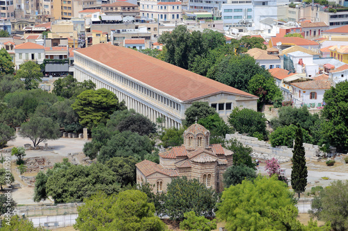 The Stoa of Attalos structure in Athens, Greece, which was an ancient market and reconstructed in the 1950s, is shown during a summer day, located just beyond the Church of the Holy Aspo photo