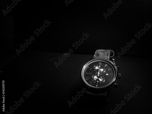 Black and white photo of luxury clock for men