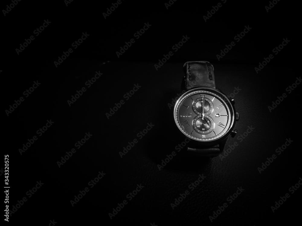 Black and white photo of luxury clock for men