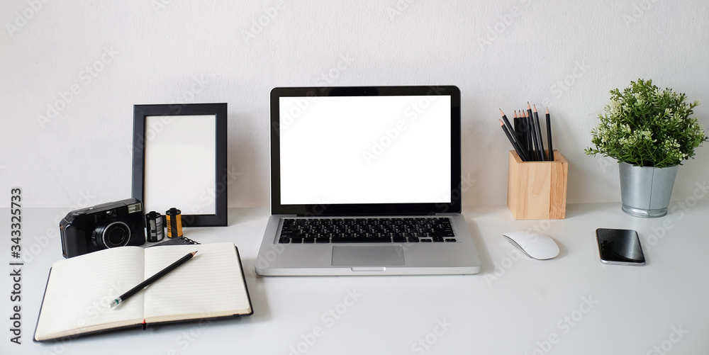 Workspace desk and laptop. copy space and blank screen. Business image, Blank screen laptop and supplies. Workspace desk and laptop. copy space and blank screen. Business image, Blank screen laptop and supplies.