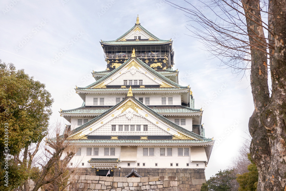 View of Osaka castle on blue sky background. View of Osaka castle on blue sky background.