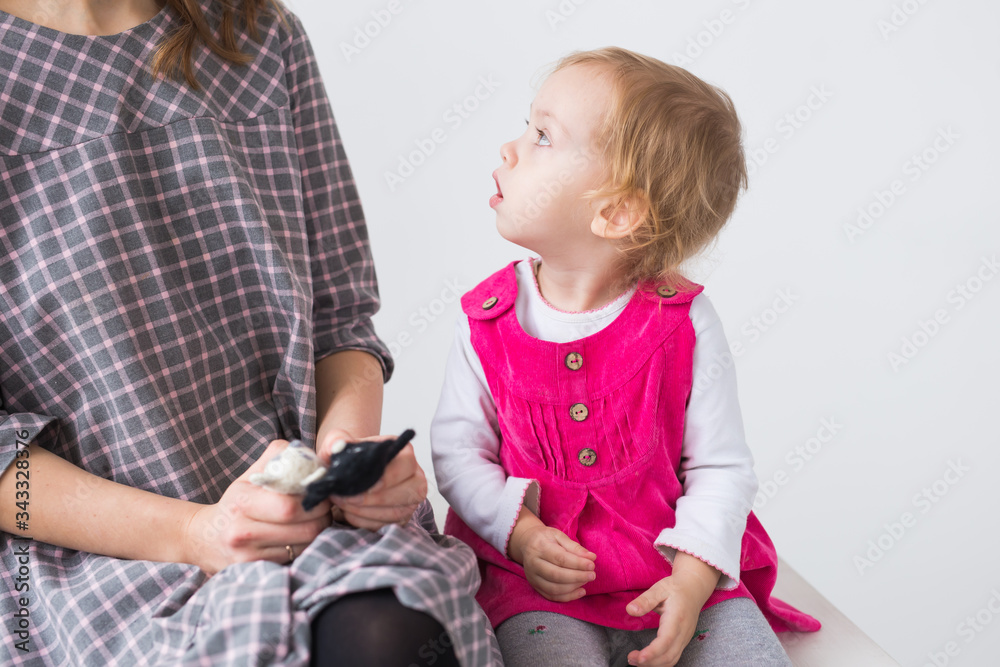 Kids and childhood concept - Cute girl, a child in a pink dress. Kids and childhood concept - Cute girl, a child in a pink dress.