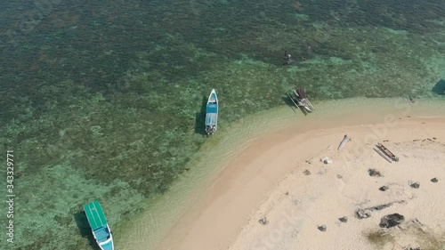 Aerial view over the amazing clear water of Samalona Island, Makassar, Indonesia photo