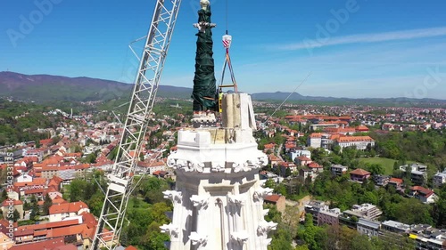 Zagreb Cathedral North Tower, damaged in Earthquake, preparing for controlled demolition by alpinists - Aerial Drone View photo