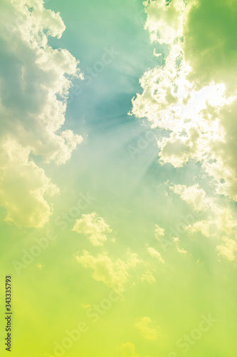 sunshine and sun rays in bright green sky with blue light