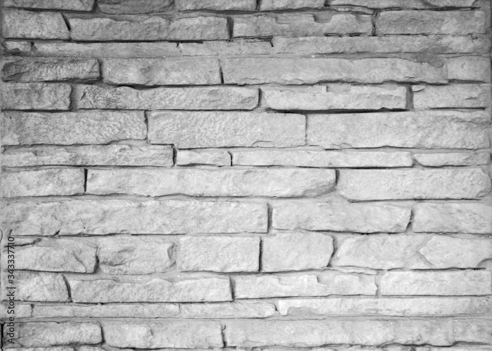Fototapeta premium black and white background texture of stone wall