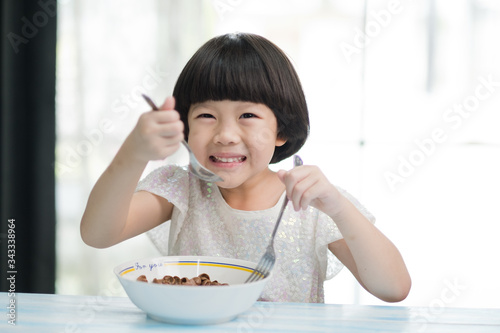 child eating food  happy time  breakfast 