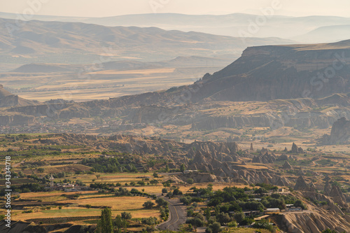 Beautiful landscape of Cappadocia plateau in a morning sunrise, Central Anatolia in Turkey photo