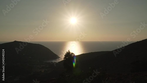 Golden hour  at the beautiful greek island of Patmos. This clip can be used in travel videos, documentaries and much more. It was shot with a Sony a6500 and a 18-105mm lens. photo