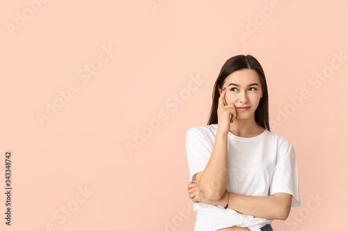 Portrait of thoughtful youn...
