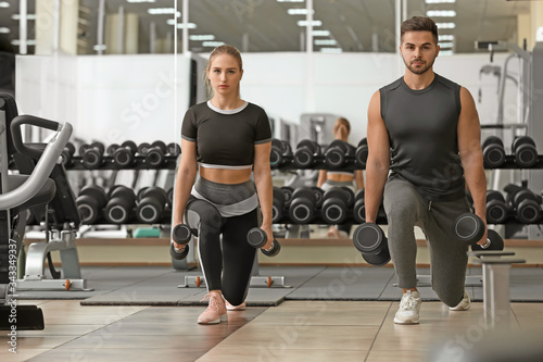 Sporty young couple trainin...