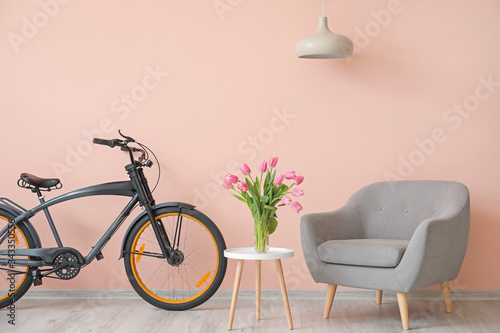 Stylish interior of modern room with bicycle