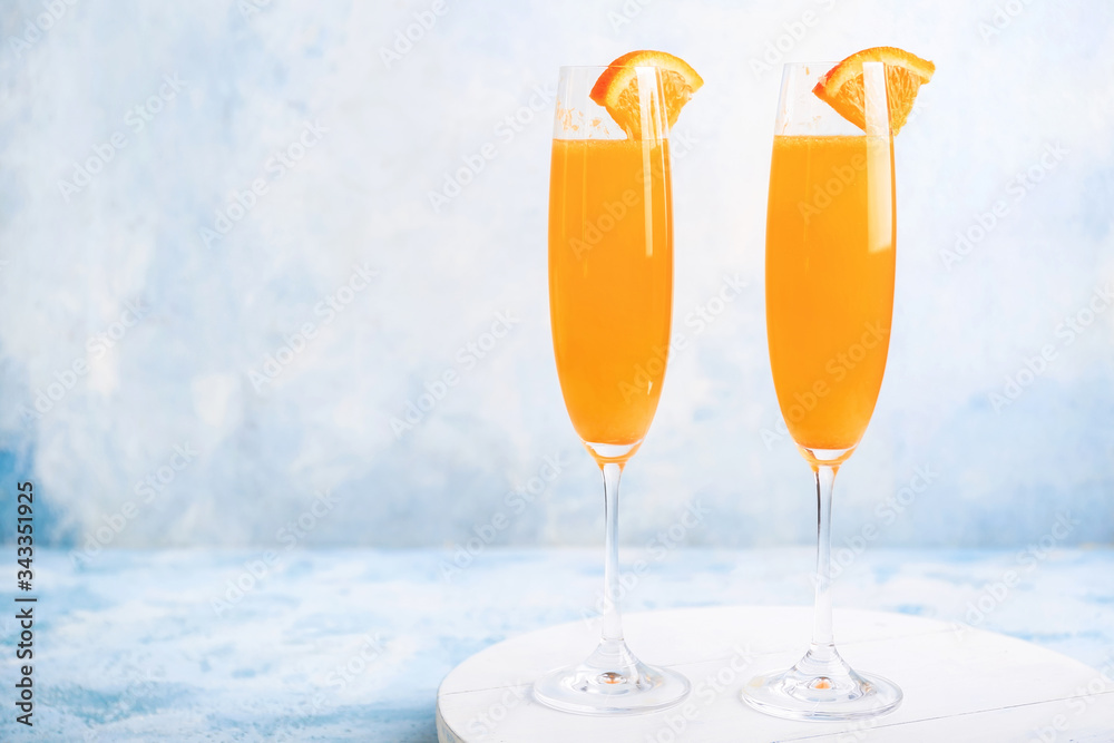 Glasses of tasty mimosa cocktails on table Glasses of tasty mimosa cocktails on table