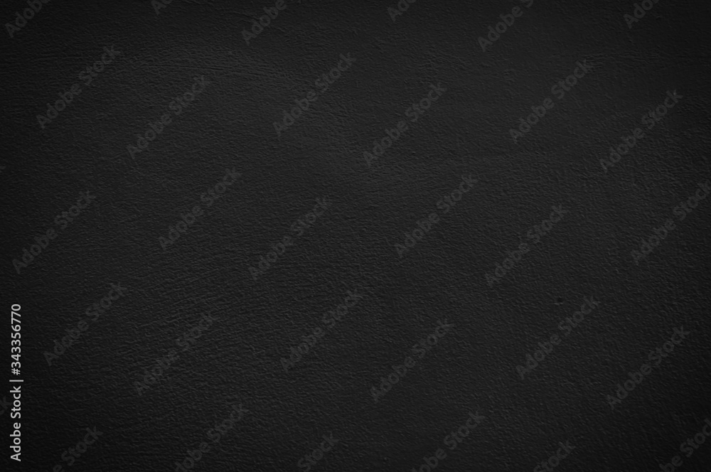 Fototapeta premium Dark rough concrete wall texture for background for design or work