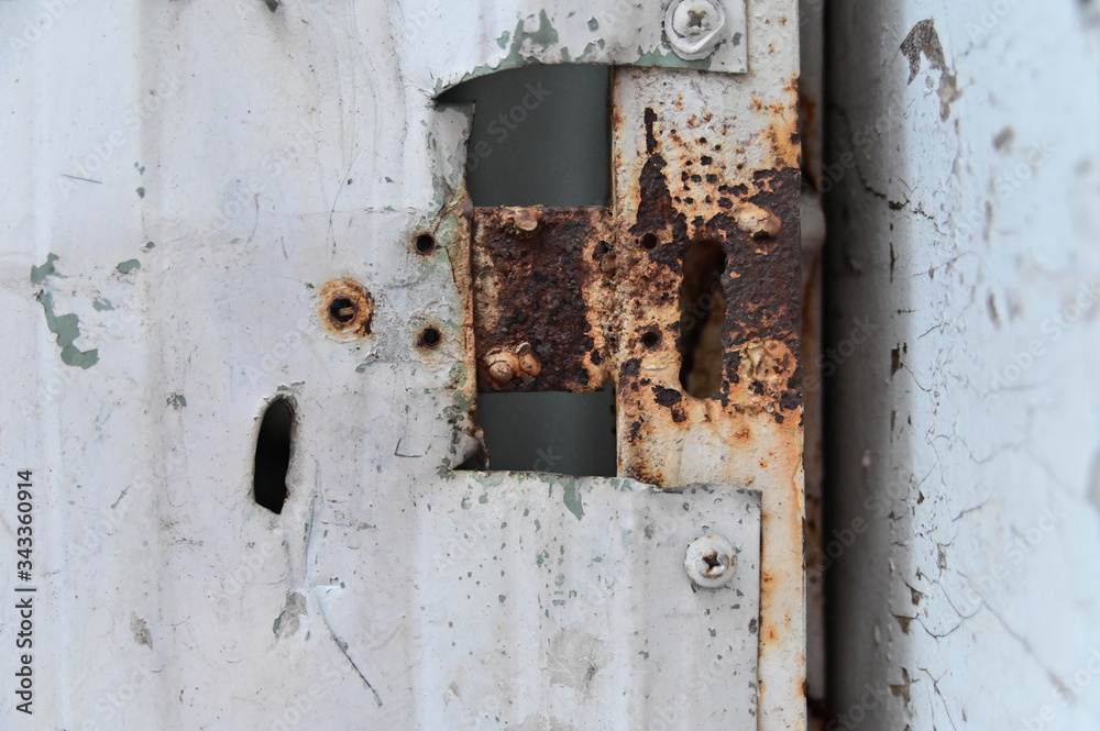 Portion Of Rusty Iron Door As Detailed Close-Up Shot. Portion Of Rusty Iron Door As Detailed Close-Up Shot.