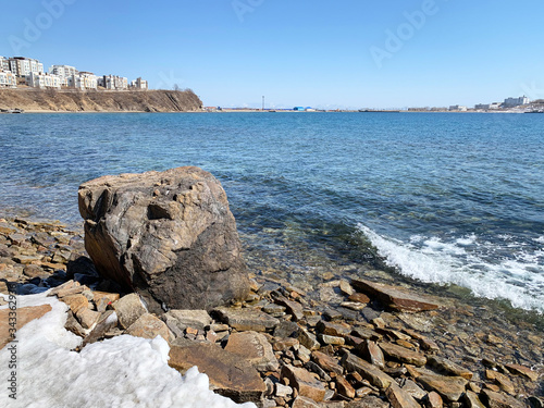 Vladivostok, Patrokles  (Patrokl) bay in the Ussuri Bay of the sea of Japan in spring in Sunny weather photo