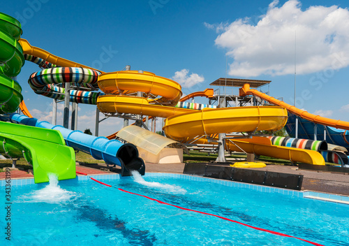 Water park with colorful slides and pools