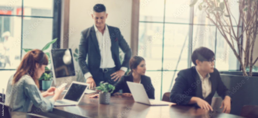 Blurred Business People Meeting in Co-Working Space Room for Discussion and Brainstrom Corporate - Teamwork Concept Blurred Business People Meeting in Co-Working Space Room for Discussion and Brainstrom Corporate - Teamwork Concept