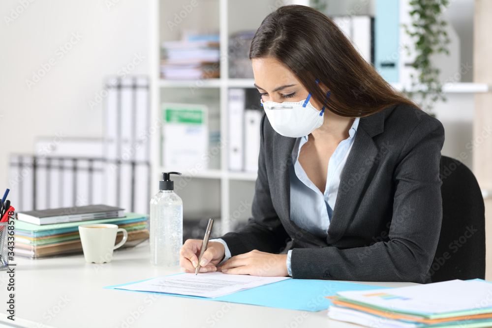 Executive with mask signing contract at office Executive with mask signing contract at office