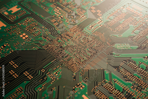 A close-up of Green coloured Solder resits Printed circuit board (PCB) with no component mounted (copper exposed)