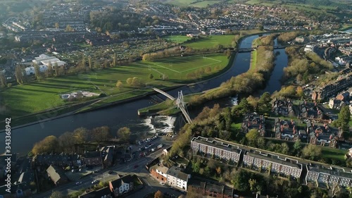 Prominent view of Millars bridge over the river Exe, view of the Exwick estate, playing fields and allotments in the background photo