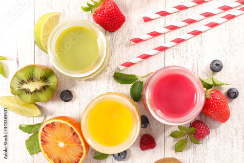 fruit juice, orange, berry fruit and kiwi smoothie