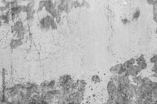 White concrete wall with black stains as background