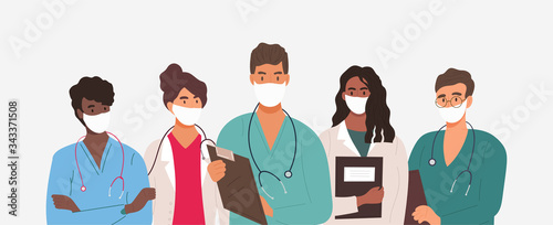 Diverse group of medics or health workers standing in a line wearing uniforms and face masks during the Covid-19 pandemic in a panorama banner, vector illustration