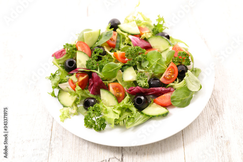 vegetable salad with cucumber, tomato and olive