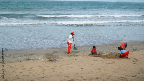 Janitor is carrying out activities Kuta Beach, Bali, Indonesia, January 29, 2017.