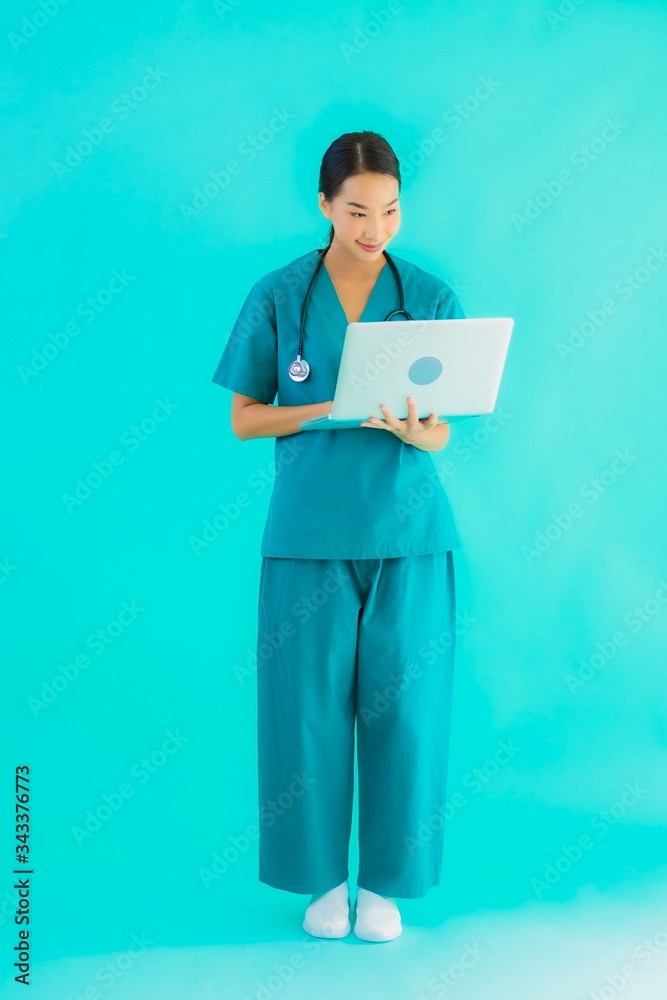 Portrait beautiful young asian doctor woman with laptop or computer Portrait beautiful young asian doctor woman with laptop or computer