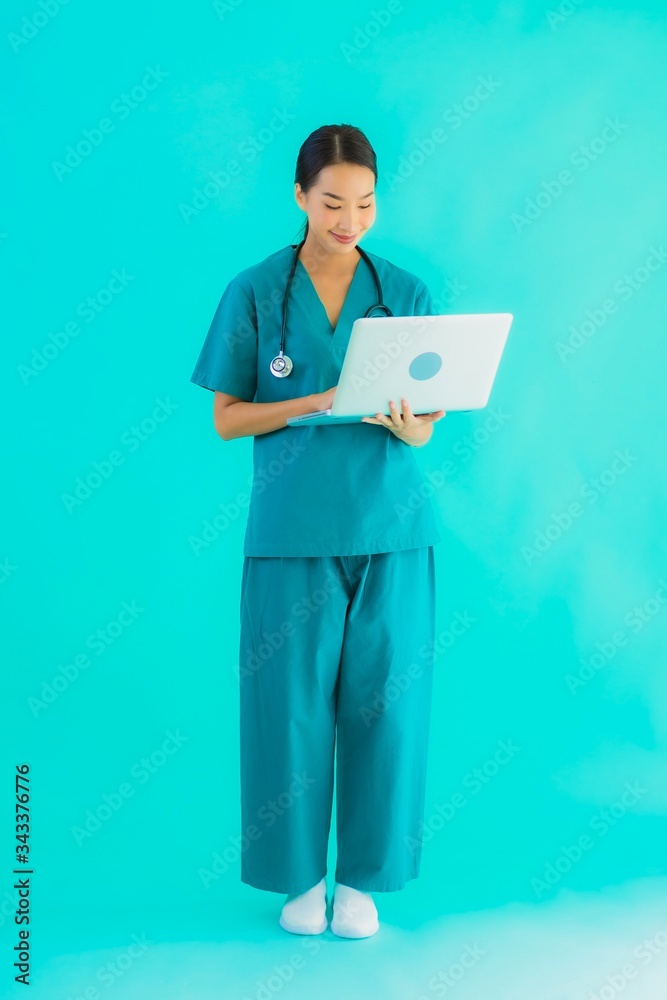 Portrait beautiful young asian doctor woman with laptop or computer Portrait beautiful young asian doctor woman with laptop or computer
