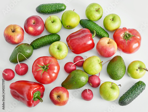 Different vegetables and fruit isolated on white background.