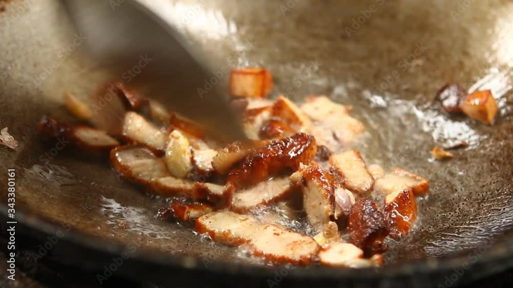 Frying chopped pork in pan , Chiangmai Thailand Frying chopped pork in pan , Chiangmai Thailand