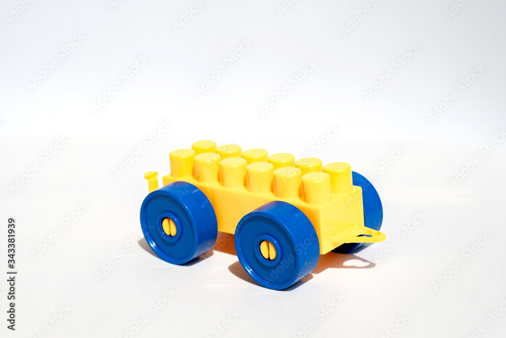 Fototapeta premium children's old toy car on a white background