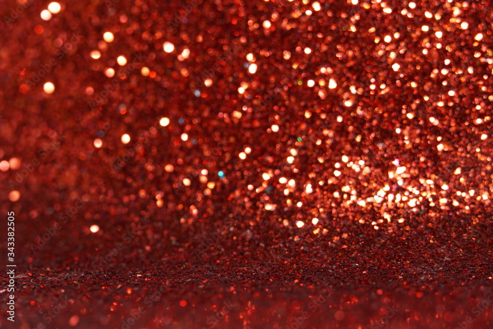 red Sparkling Lights Festive background with texture. Abstract Christmas twinkled bright bokeh defocused and Falling stars. Winter Card or invitation red Sparkling Lights Festive background with texture. Abstract Christmas twinkled bright bokeh defocused and Falling stars. Winter Card or invitation