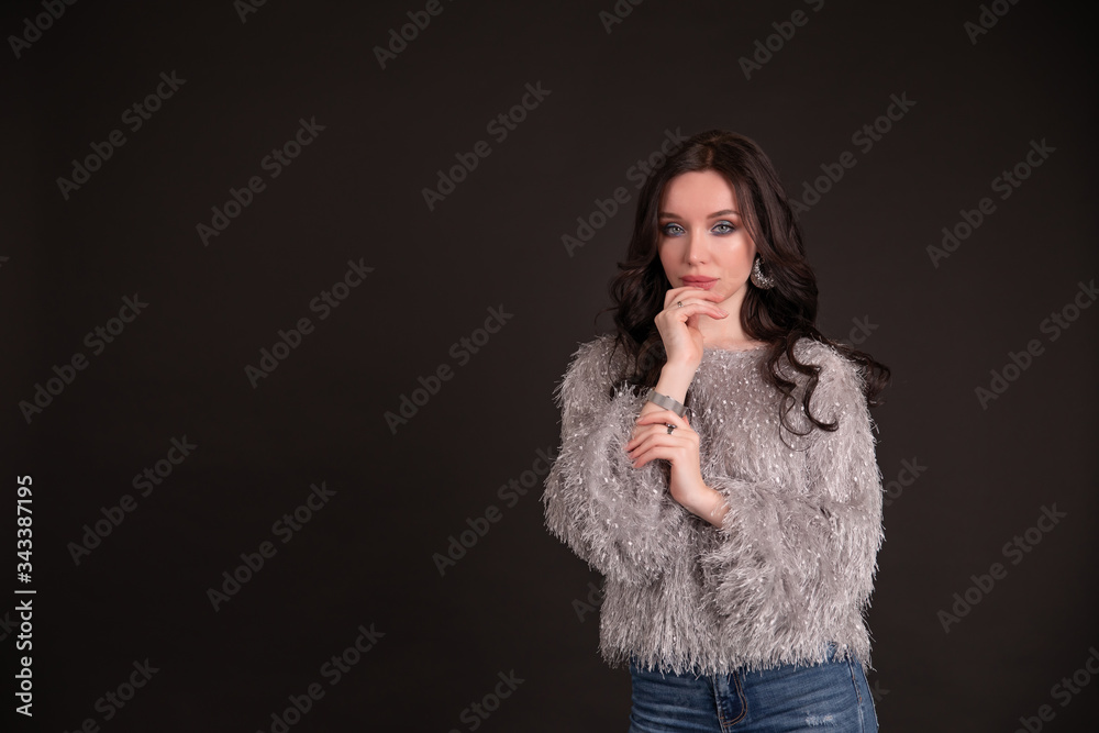 Beautiful girl on a black background. copy space. Beautiful girl on a black background. copy space.
