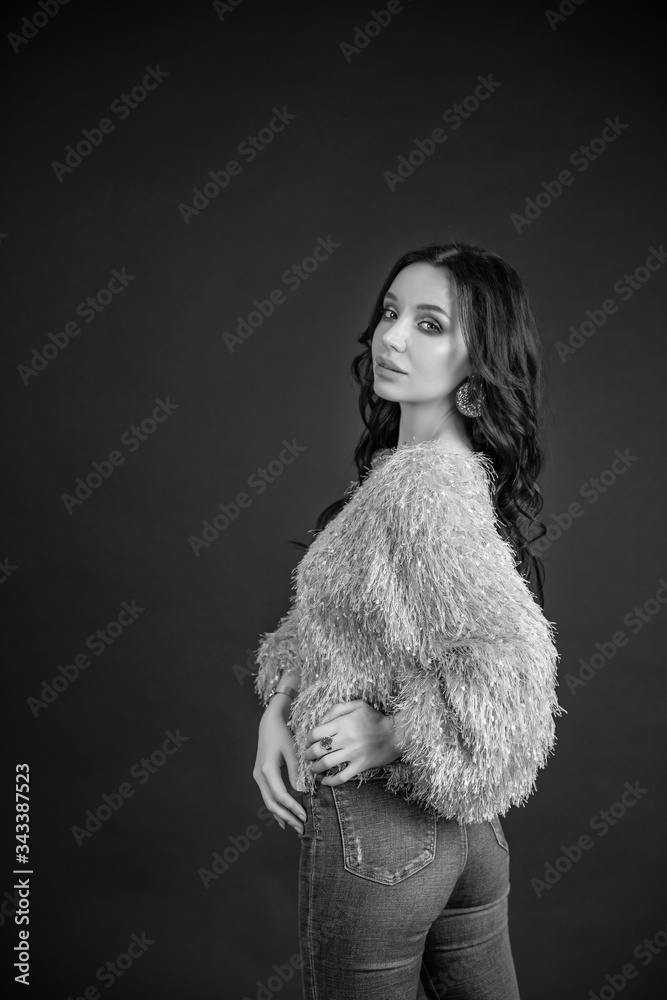 Beautiful girl on a black background. copy space. Beautiful girl on a black background. copy space.