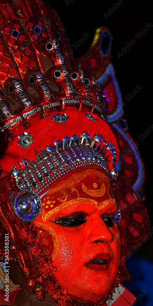 Fototapeta premium These are typical Theyyam artists dressed up during an annual Thira festival in north Malabar region in the state of Kerala in India.