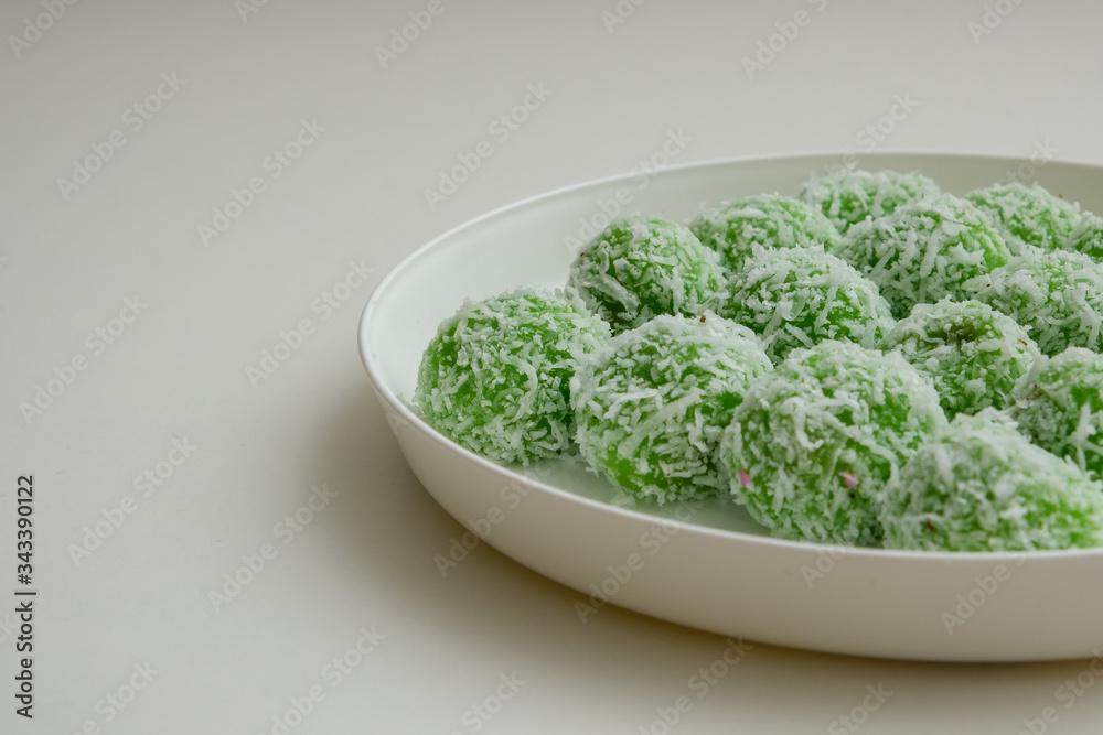 Malay traditional food Buah Melaka. Selective focus. Lighting on right Malay traditional food Buah Melaka. Selective focus. Lighting on right