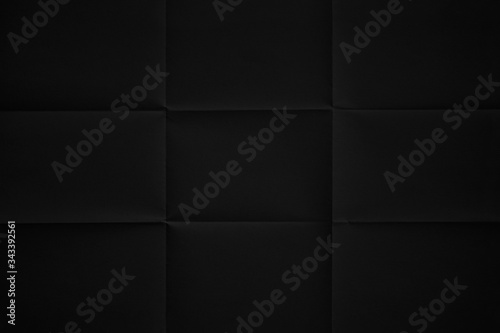 Black paper folded in nine fraction background