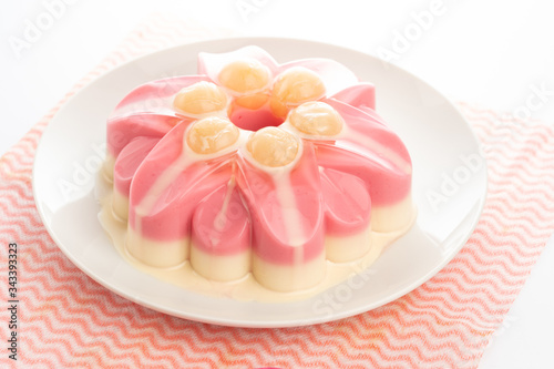 sweet pudding with longan sweetens milk on white background
