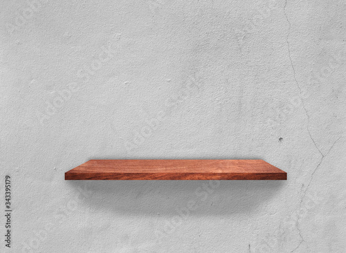 Wood shelves on concrete wall texture background with clipping path. Top view