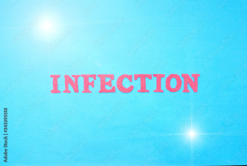 The word infection in red letters on a blue background. The concept of sexually transmitted and respiratory infections, rotavirus, hepatitis The word infection in red letters on a blue background. The concept of sexually transmitted and respiratory infections, rotavirus, hepatitis