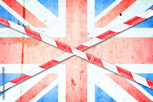English flag crossed out with barrier tape. The country is quarantined. Coronavirus. KOVID 19. Pandemic. photo