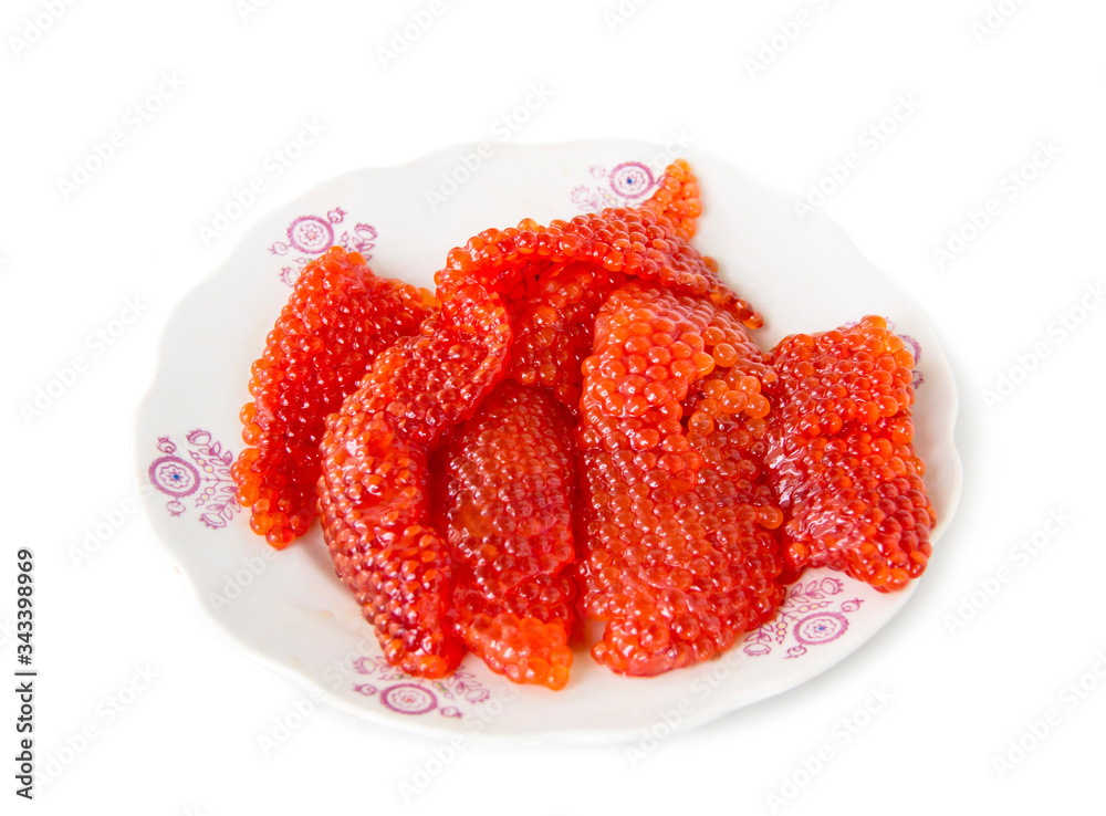 Red fresh salmon ROE breeds of fish lying on a plate, white background