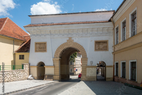 Schei gate in old city of Brasov, Transylvania, Romania; summer day